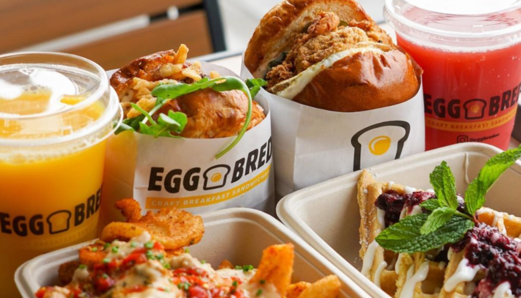 breakfast sandwiches, potatoes, waffles and juices from eggbred are perfect for brunch